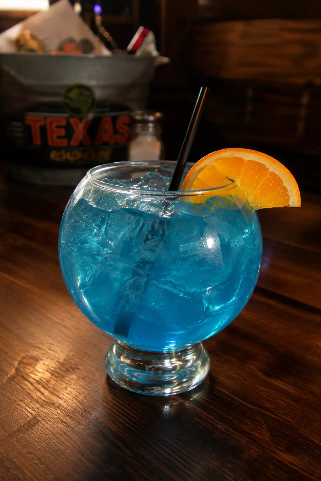 Kenny's Cooler cocktail being shaken with ice in a cocktail shaker